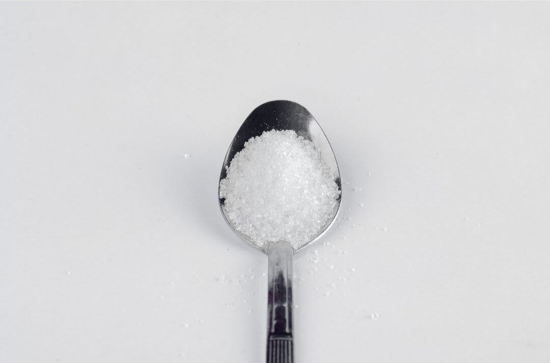 Spoon with refined sugar
